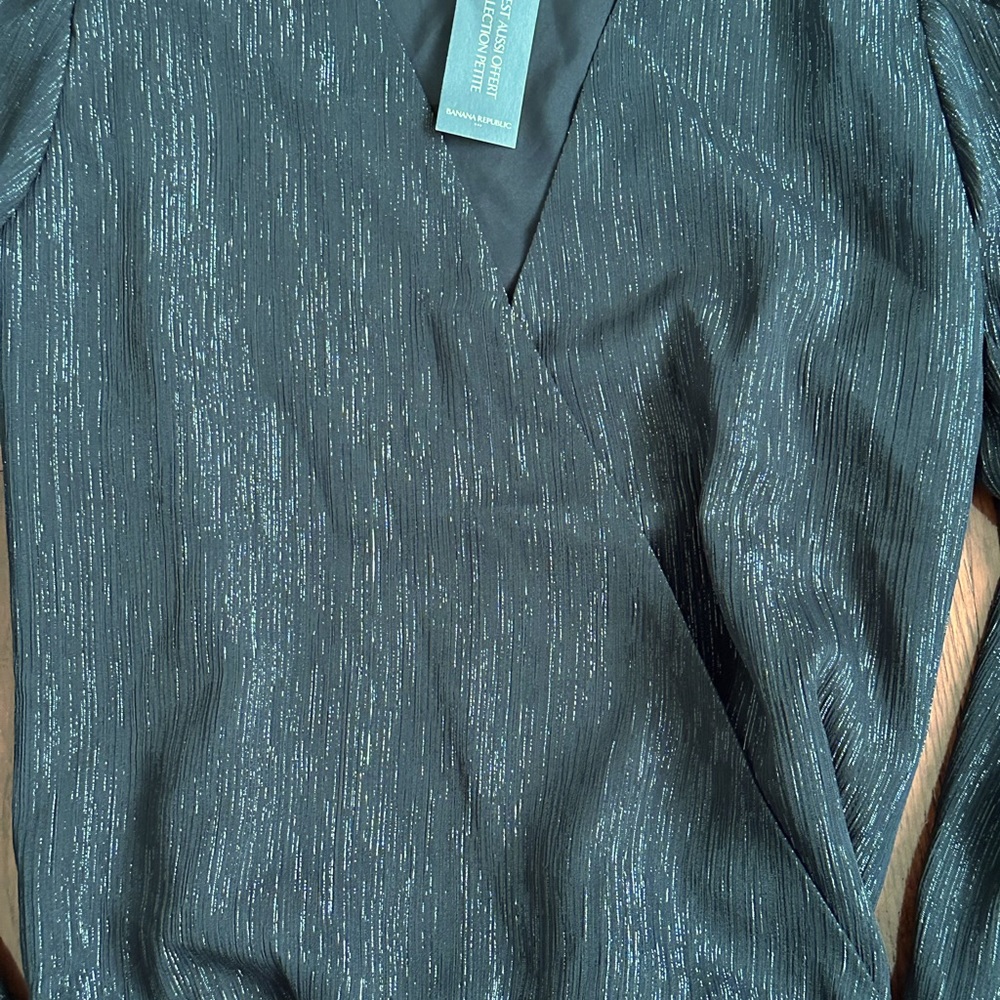 NWT Banana Republic blouse. Shiny black, elastic back waist and cross front